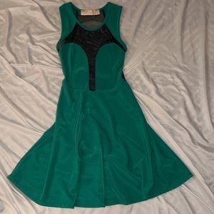 Green dress with mesh panels